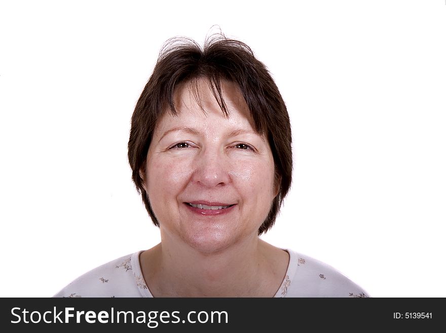 A smiling middle-aged woman on white background smiling. A smiling middle-aged woman on white background smiling