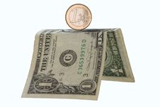 One Euro Coin On One Dollar Pedestal Isolated On W Stock Photos