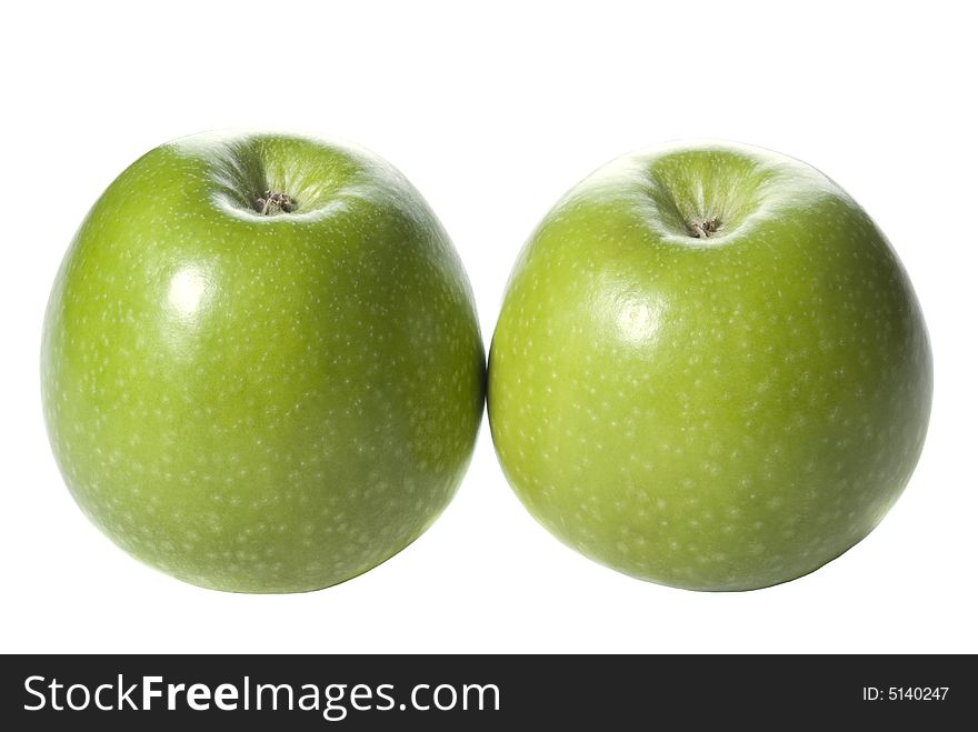 Green apple isolated on the white background. Back light source. Green apple isolated on the white background. Back light source.