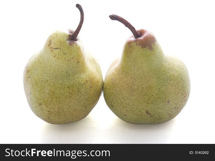 Double pears isolated on the white background with shadow.