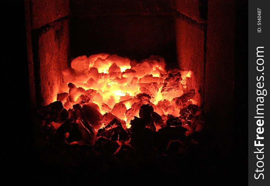 Embers in a fire-place.