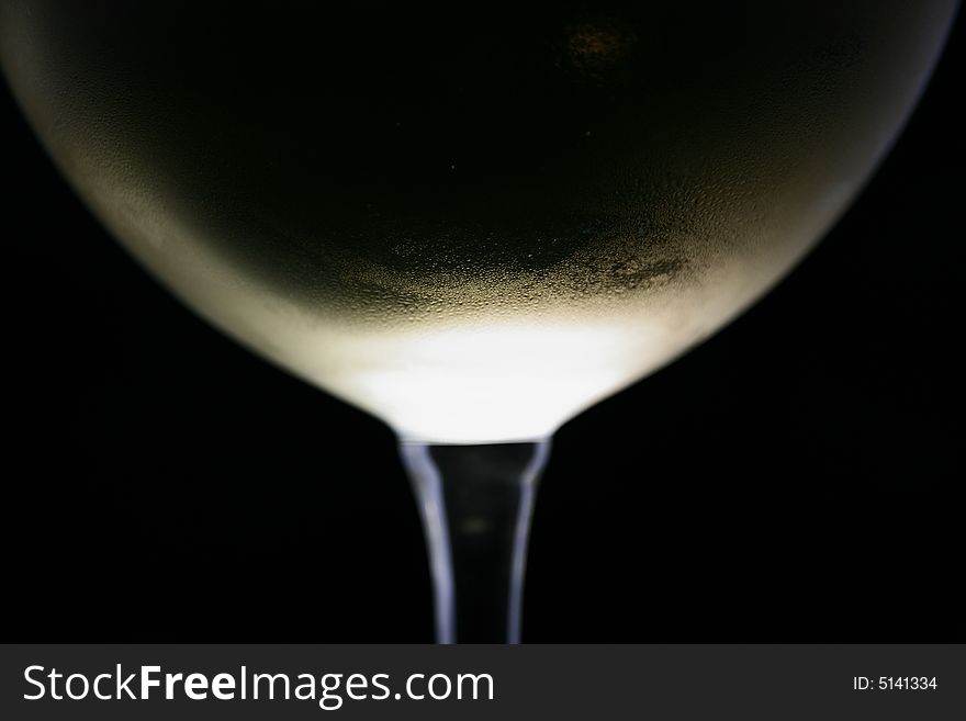 Chilled white wine in a glass. Chilled white wine in a glass