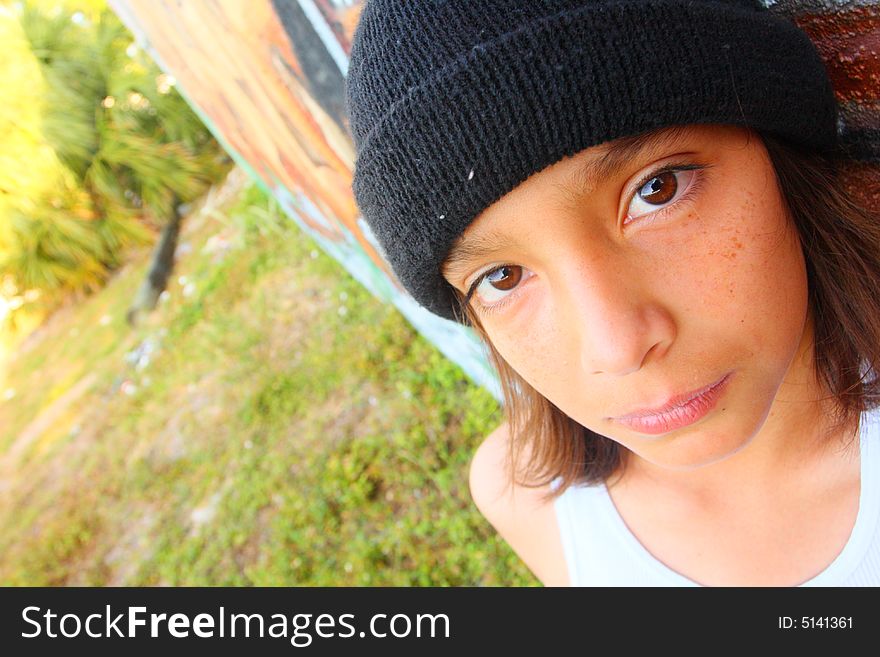 Young Boy With A Cap