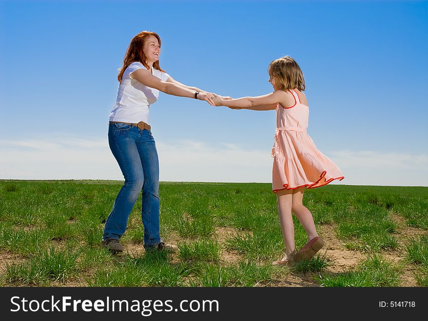 Mother And Daughter Whirling