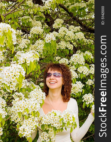 Girl with white flowers tree