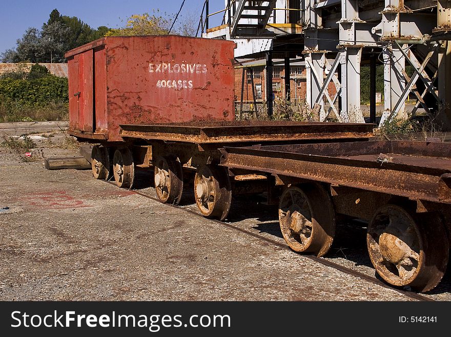 Blyvooruitzicht gold mine carletonville south africa. This image depicts an old and rusted explosives car used to transport explosives underground. This shaft has been decommissioned following the mining of the last gold from the shaft stabilizing pillar, a difficult and dangerous activity