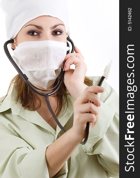 An image of a woman in mask with stethoscope