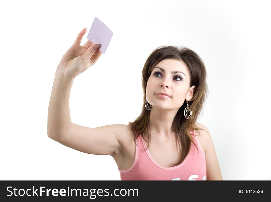 A girl sticking a note on the glass wall. A girl sticking a note on the glass wall