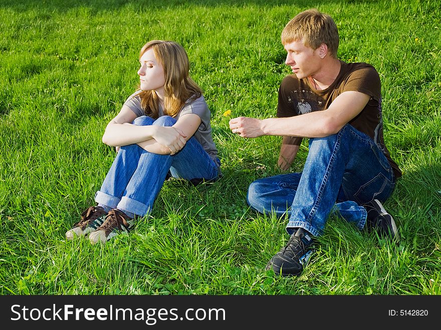 Young couple on the grass