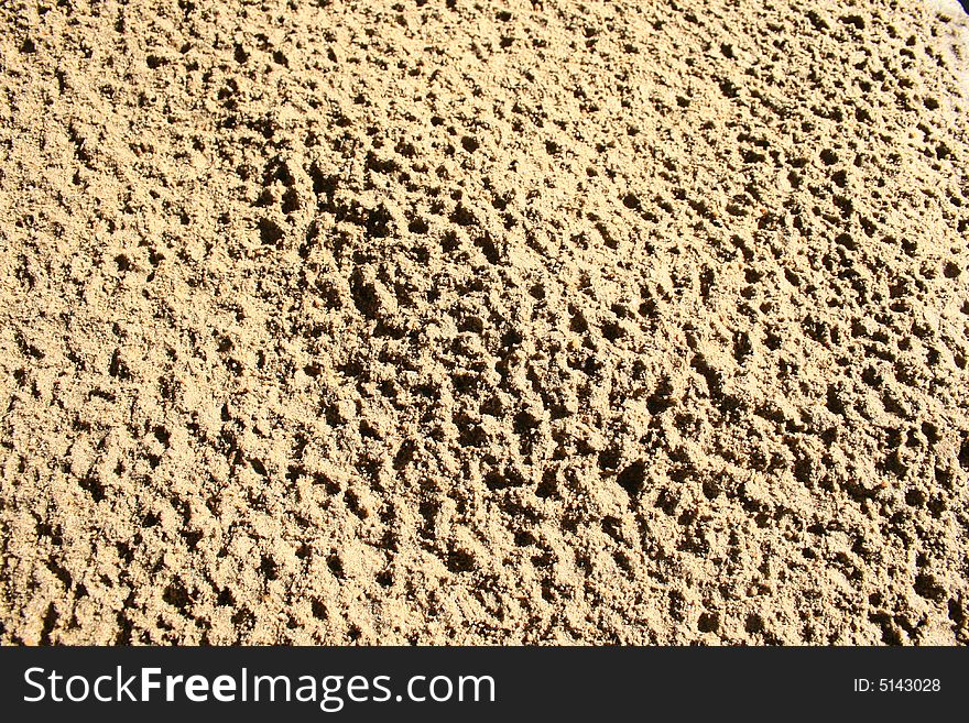 Damp sand at a building site. Damp sand at a building site