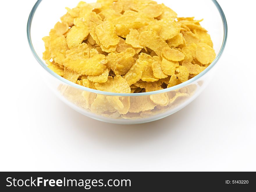 Corn-flakes in a transparent bowl