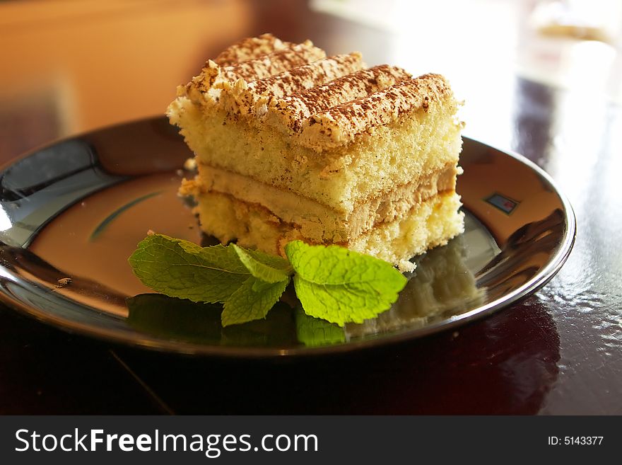 A slice of tiramisu cake. A slice of tiramisu cake