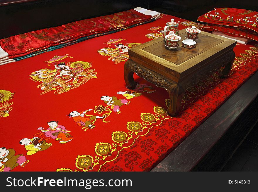 Here is a bed of China's Ming and Qing Dynasties.Arrangement and ornament of the bedroom include very deep Chinese traditional culture. It is Chinese's favorite color to be red, its implied meaning is happy, joyous. Here is a bed of China's Ming and Qing Dynasties.Arrangement and ornament of the bedroom include very deep Chinese traditional culture. It is Chinese's favorite color to be red, its implied meaning is happy, joyous.