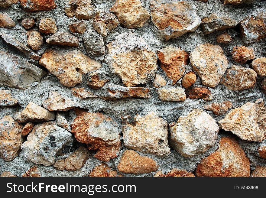 Closeup of stone wall use for construction business and designers. Closeup of stone wall use for construction business and designers