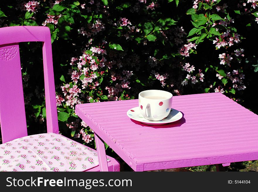 Time for a tea break in the garden in summertime. Time for a tea break in the garden in summertime