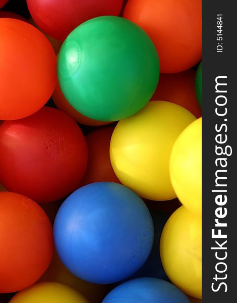 Colourful plastic balls, as used in children's play equipment. Colourful plastic balls, as used in children's play equipment