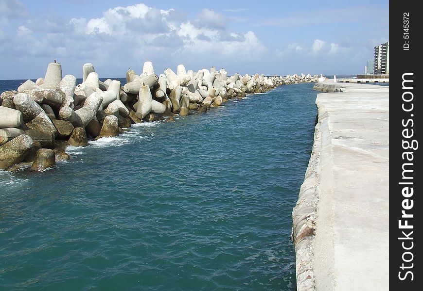 Breakwater line along the coast, in Cuba