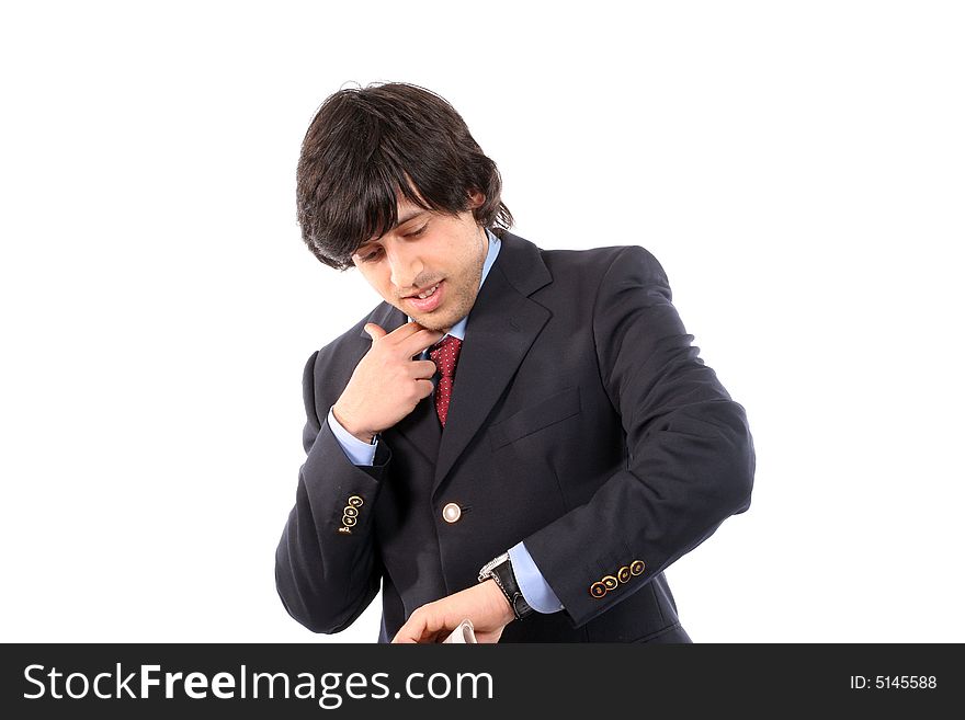 Worried businessman consulting his watch, isolated on white background