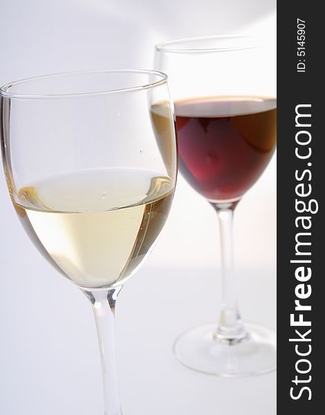 Glasses with white and red wine. Glasses with white and red wine