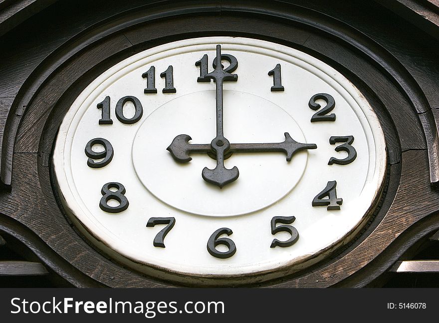 Close up of old wooden clock face