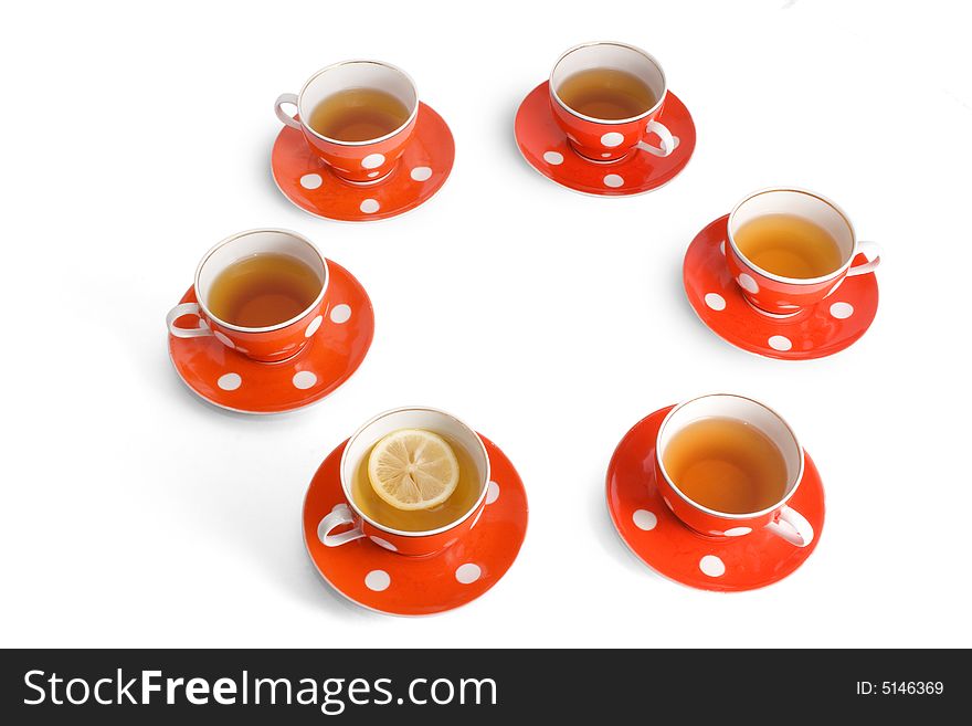 Six teacups on the white backround