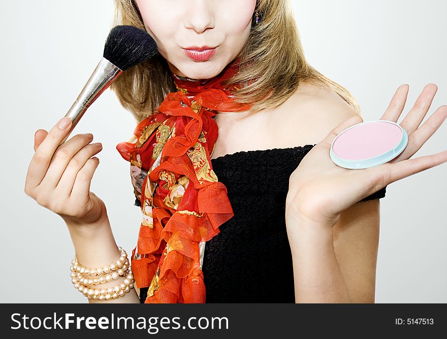 Beauty girl with make-up brush