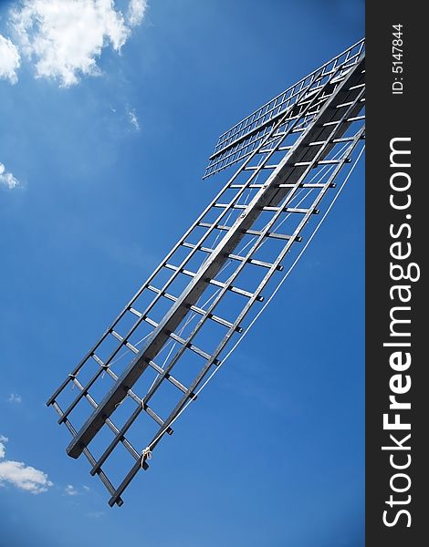 Sail of mill with blue sky in country of la mancha in spain