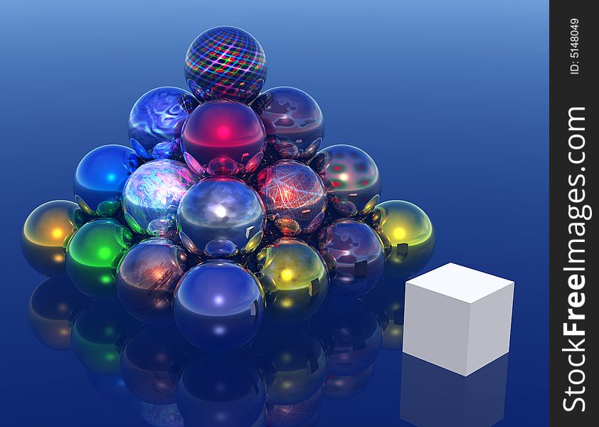 Colourful pyramid made from sphere, and beside the cube