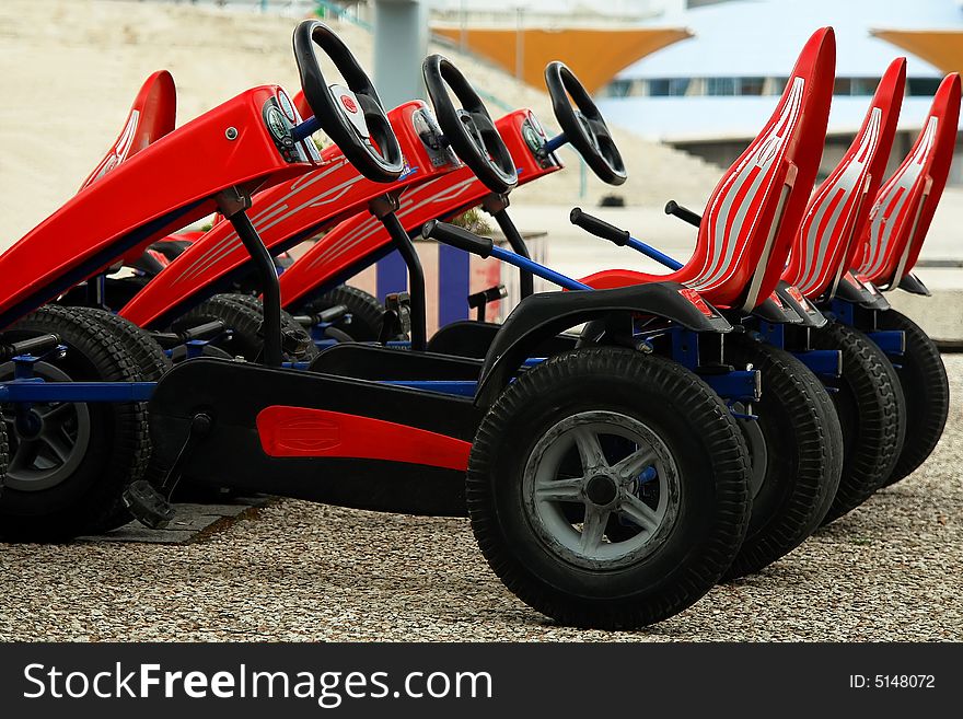 Toys pedal cars in the park. Toys pedal cars in the park