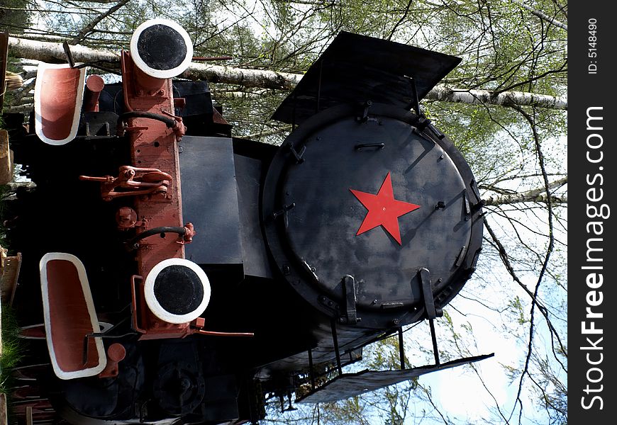 The old locomotive in one spring day - monument.