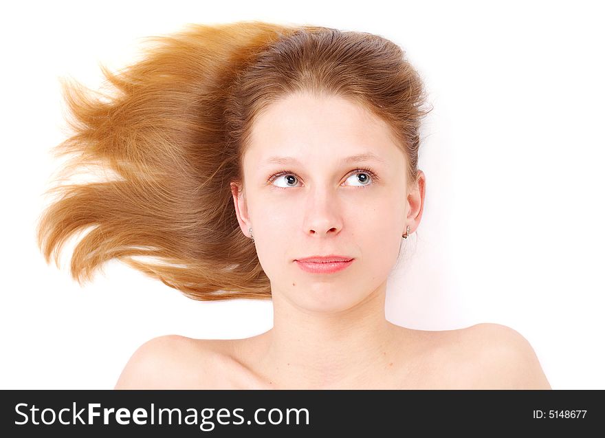 Pretty girl with flowing hair over white