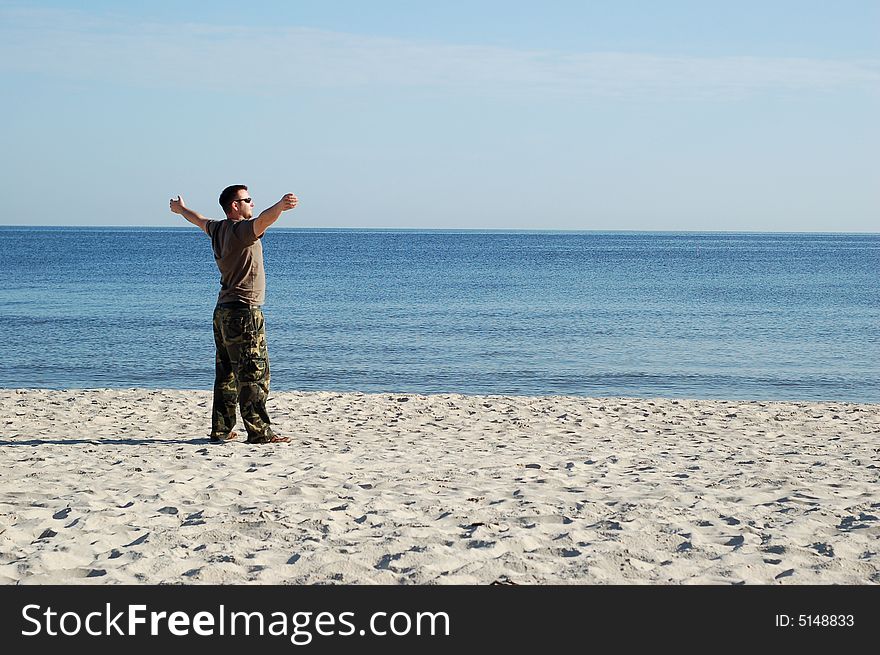 Man relaxing on the beach. Man relaxing on the beach