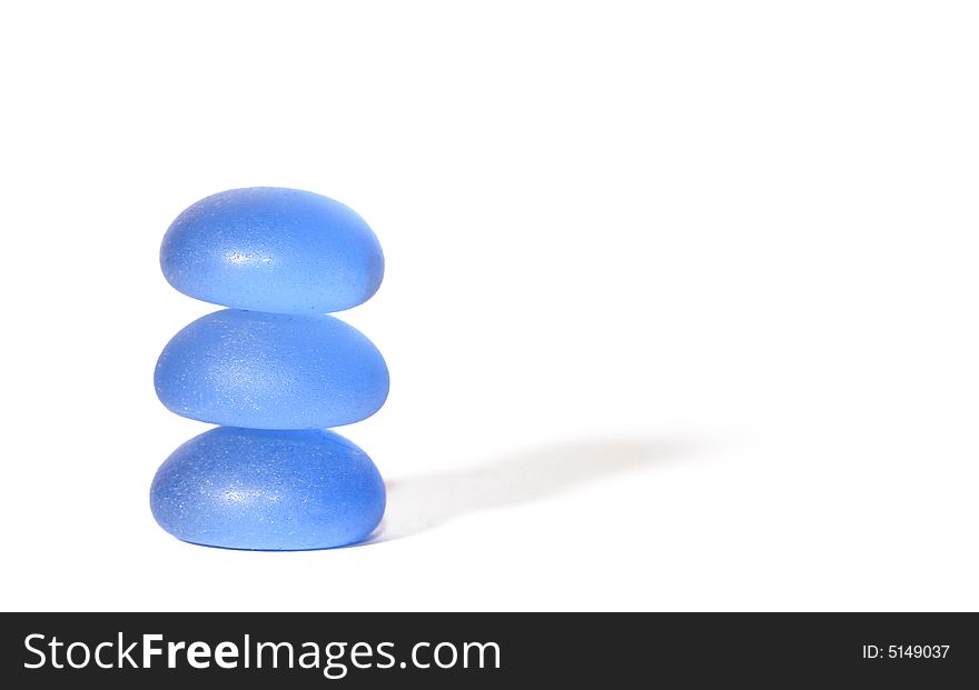 Three glass stones piled up to a tower