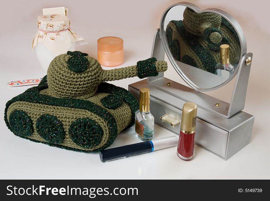 Toy tank with a makeup mirror