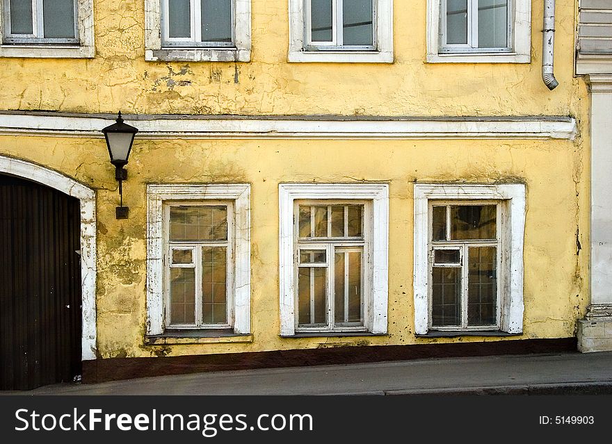 Old wall of house with a  in Europe