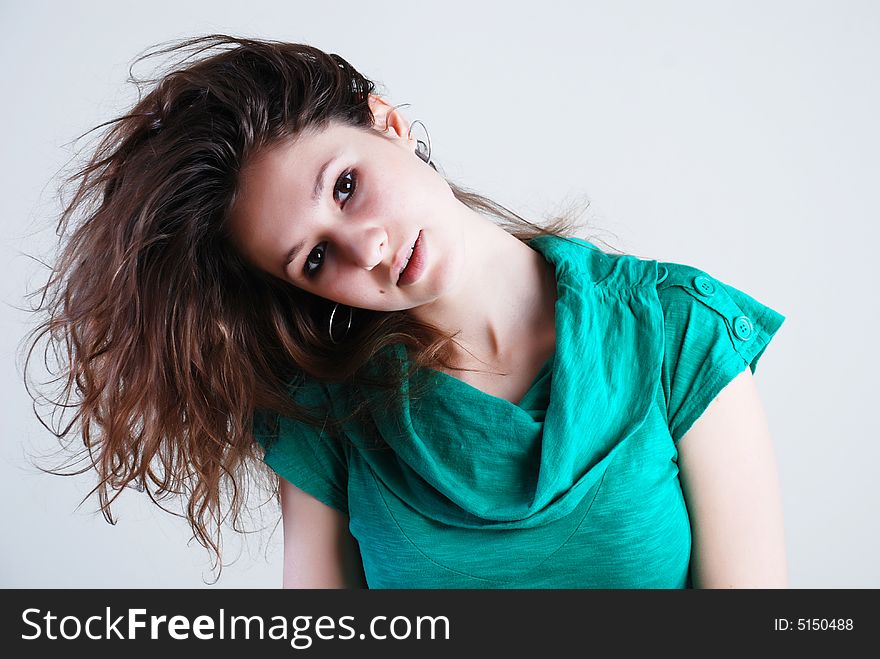 Beauty fashion woman in green clothes at white background. Beauty fashion woman in green clothes at white background