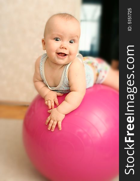 The Joyful Child On A Ball