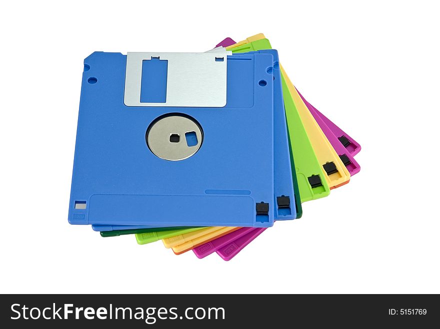 Pile on colored floppy disks isolated on white