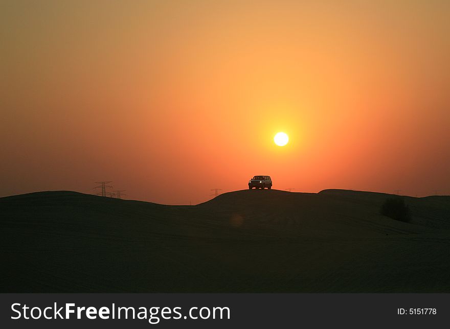 Traveling in Desert During Sunset