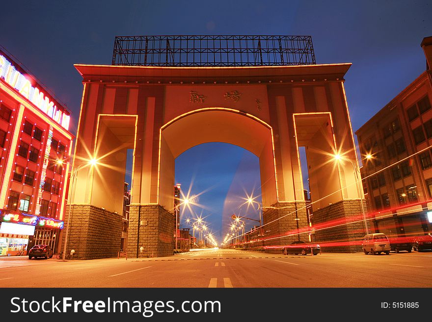 Car Through Gate At Night