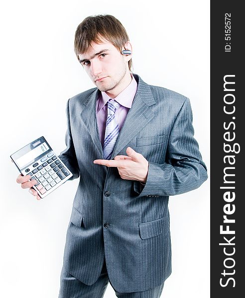 Upset businessman with calculator, isolated on white background. Upset businessman with calculator, isolated on white background