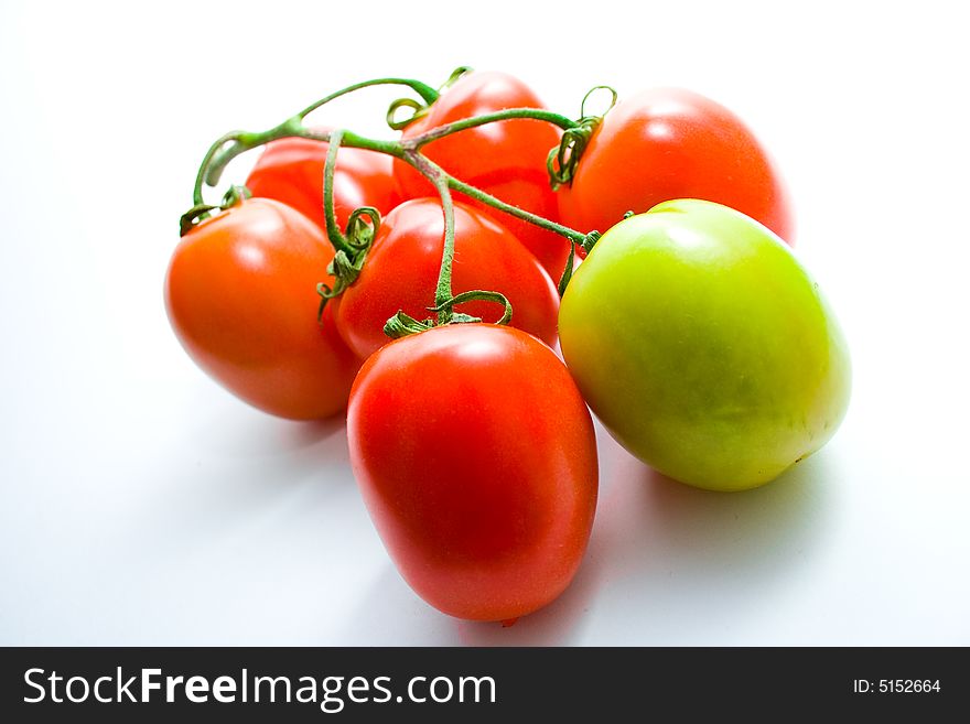 Vegetables tomatos on white background