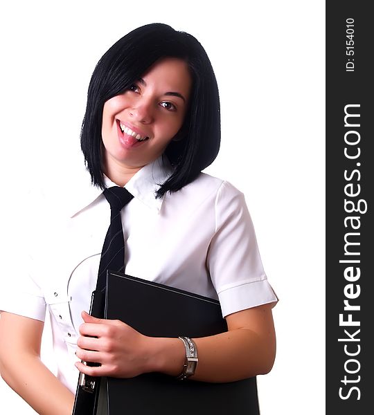 A portrait about a young pretty happy businesswoman with black hair who is holding some folders at the office, she is sticking out her tongue and she is wearing a white shirt and a black tie. A portrait about a young pretty happy businesswoman with black hair who is holding some folders at the office, she is sticking out her tongue and she is wearing a white shirt and a black tie