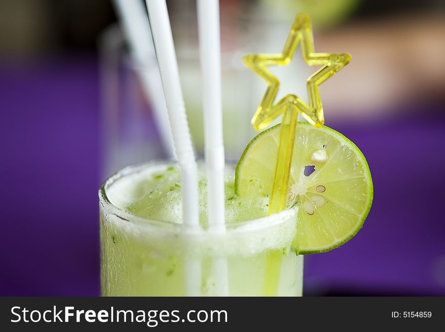 Coctail with focus on lime. Coctail with focus on lime