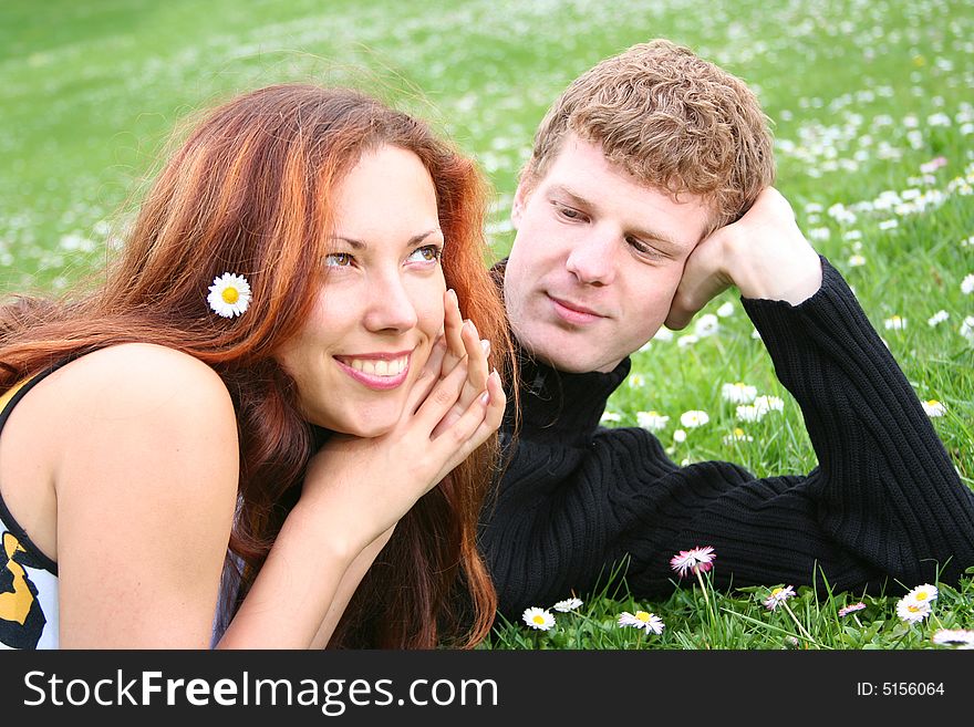 Happy couple is relaxing outdoors. Happy couple is relaxing outdoors