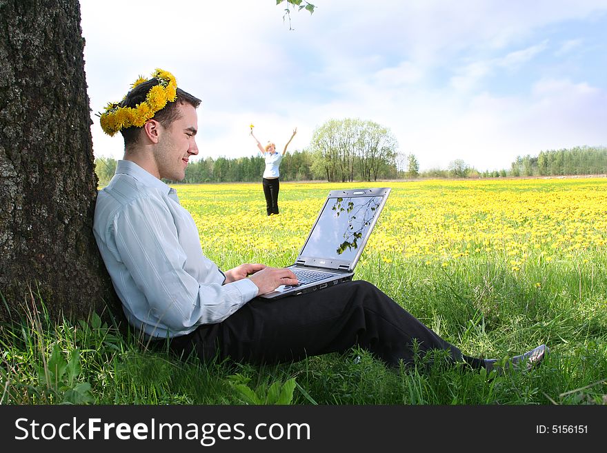 Young guy is working outdoors. Young guy is working outdoors