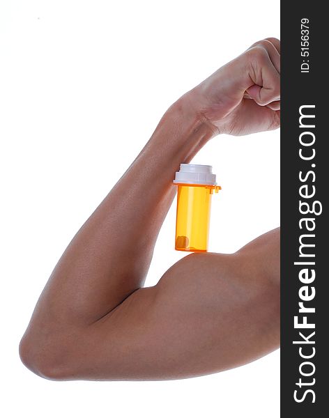Muscular arm holding a bottle of pills. Muscular arm holding a bottle of pills