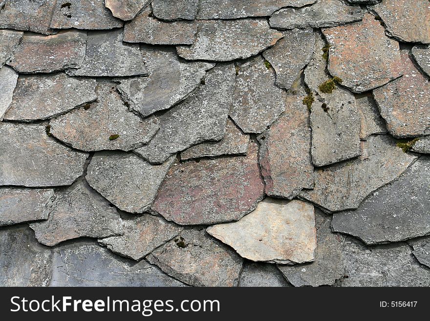 A background of stones of a roof. A background of stones of a roof.