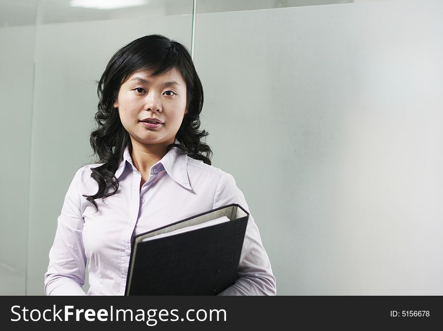 Working Asian Women With Folder