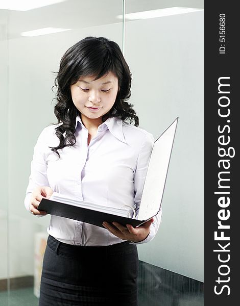 Working Asian Women With Folder